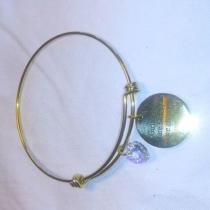 Adjustable gold tone bracelet